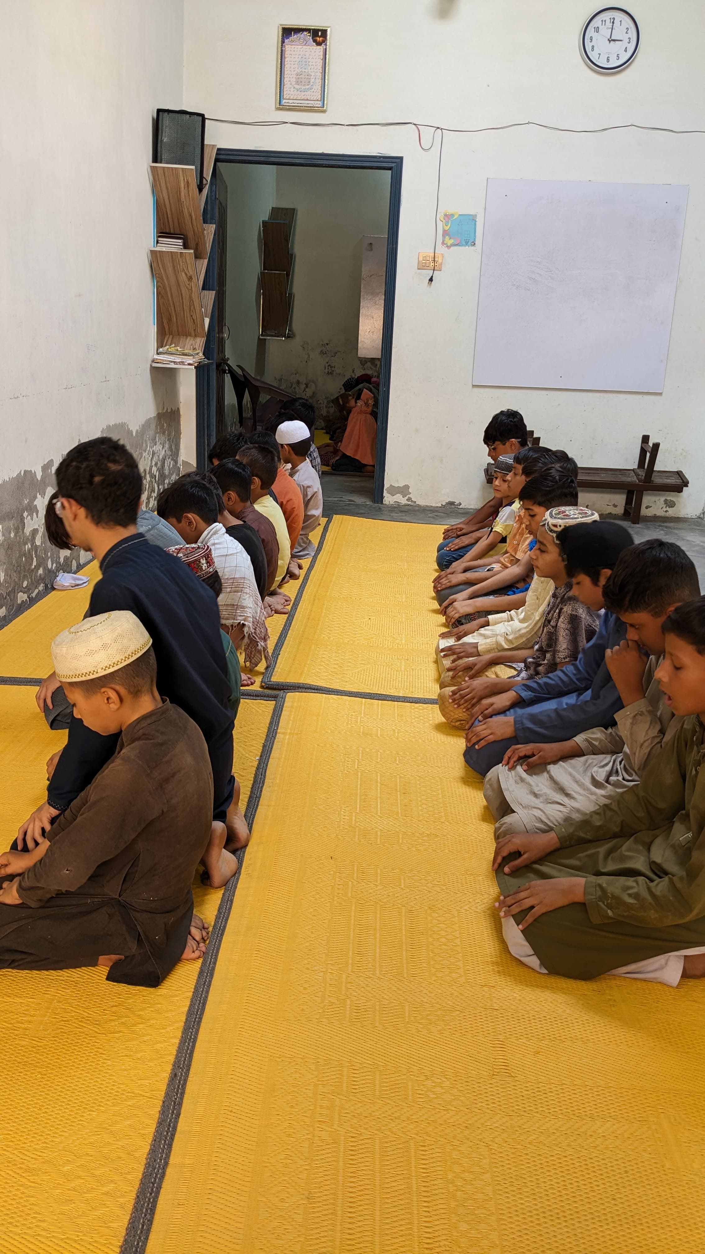 Students prayer line at Al Mus'haf session